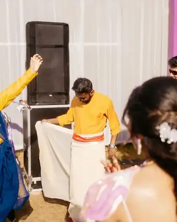 Family members dancing at a haldi ceremony hosted by Anu Manocha