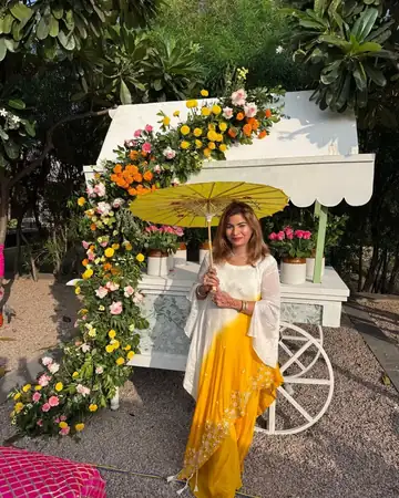 Anu Manocha at a flower-cart setup for a daytime wedding function