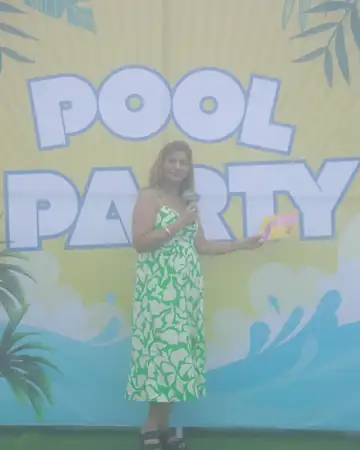 Anu Manocha hosting a pool party on stage