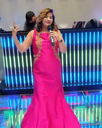 Anu Manocha on an LED stage at a wedding sangeet