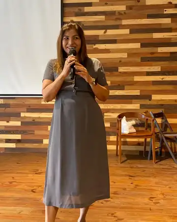 Anu Manocha addressing the audience at a seminar