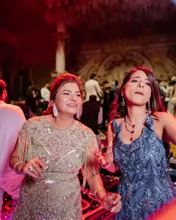 Anu Manocha with guests on the dance floor at a wedding celebration